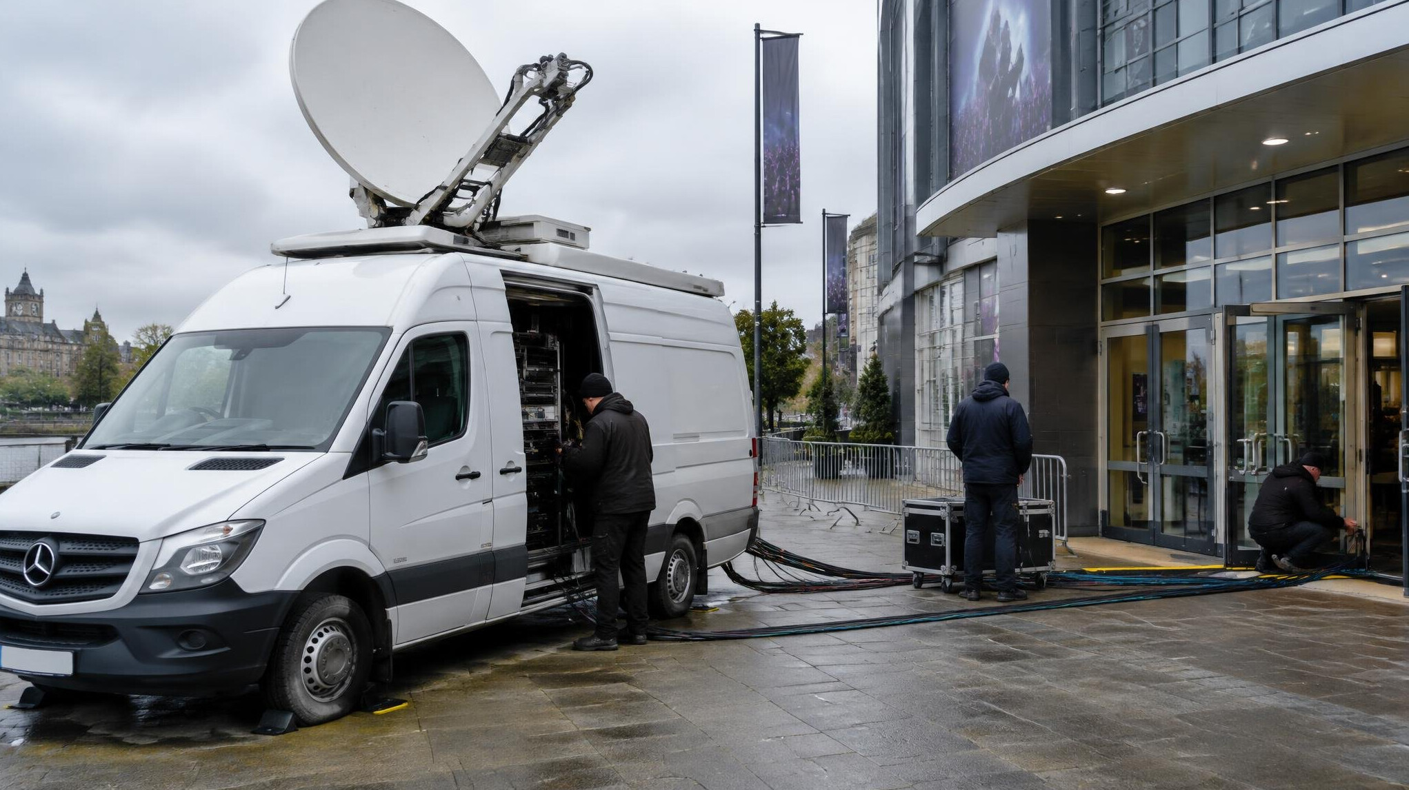 Outside broadcast van with satellite dish at an event